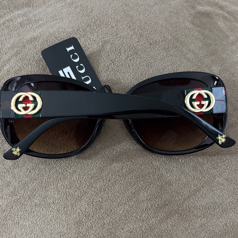 Gucci Black Cat-Eye Sunglasses with Gold Double G and Red/Green Accent